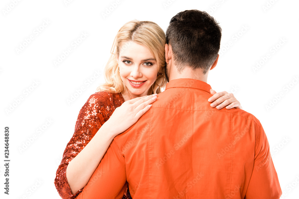 Fototapeta premium Back view of man hugging attractive girlfriend isolated on white