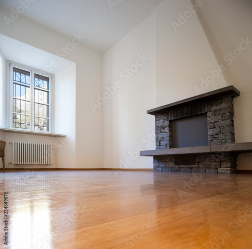 Empty living room with fireplace photo