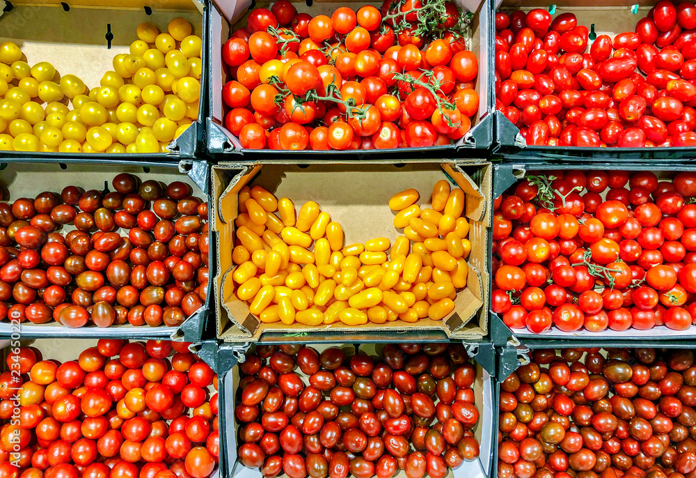 Display of assorted cherry tomatoes.