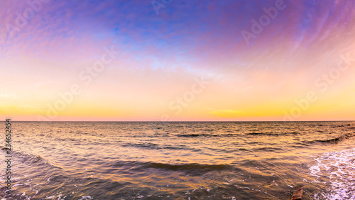 Sunset at the ocean as a background