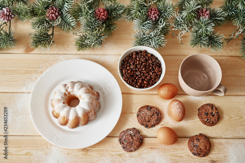 Wallpaper Mural Christmas coffe and cookies on table. Christmas  decorations with lights background. Happy New Year! Christmas greeting card. Winter card template. Xmas concept. Holiday Banner. Feast of Nativity.  Torontodigital.ca