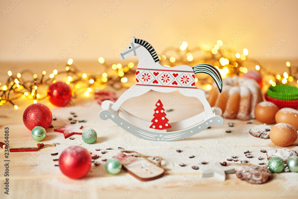 Christmas table. Christmas  decorations with lights background. Happy New Year! Christmas greeting card. Winter card template. Xmas concept. Holiday Banner. Feast of Nativity. 
