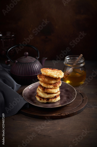 Russian fried quark pancakes syrnyky or tvorozhniki photo