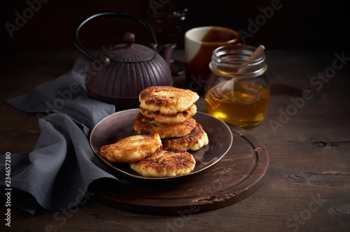 Russian fried quark pancakes syrnyky or tvorozhniki photo