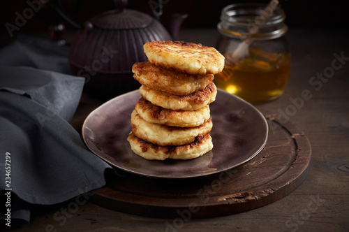 Obraz na płótnie Russian fried quark pancakes syrnyky or tvorozhniki w salonie