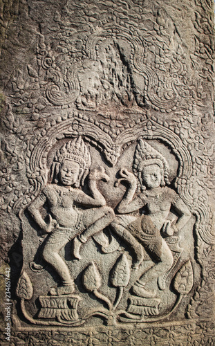 Stone carving Apsara in Bayon temple at Angkor Thom