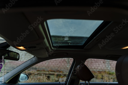 Black car on industrial background