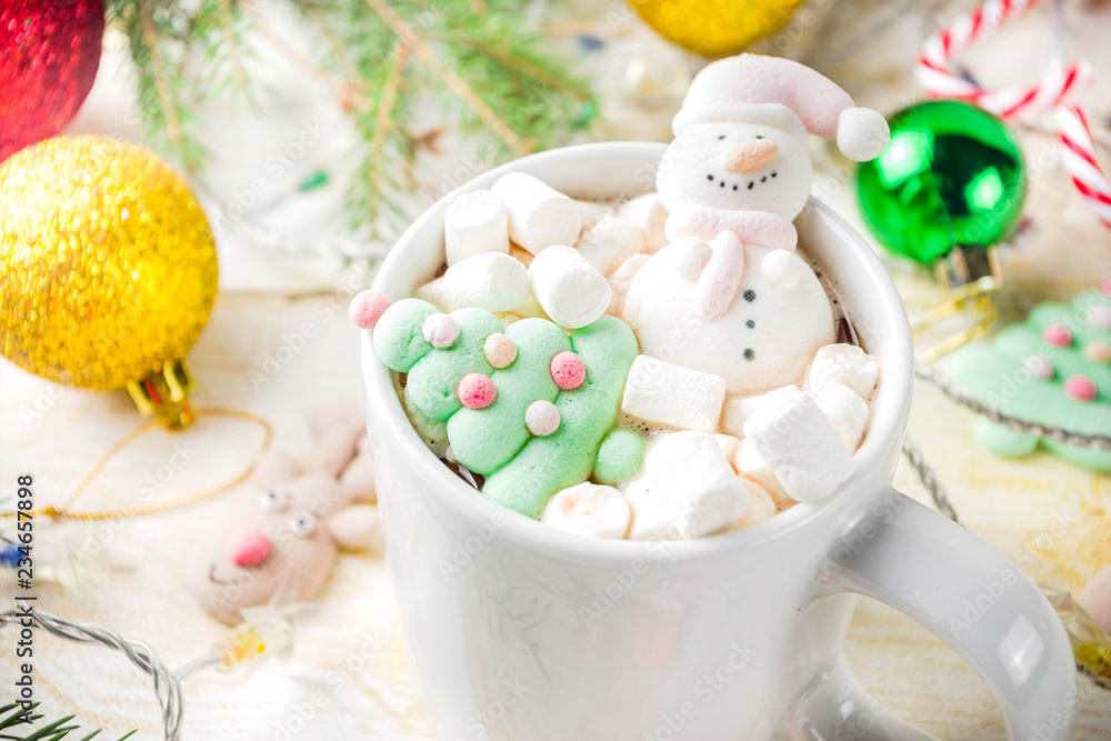 Creative idea for christmas drink, delicious hot chocolate with funny marshmallow snowman, christmas tree, rain dear, santa, on home background with xmas decoration copy space top view