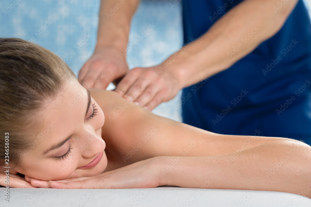Closeup of relaxed young woman enjoying procedure in spa Closeup of relaxed young woman enjoying procedure in spa