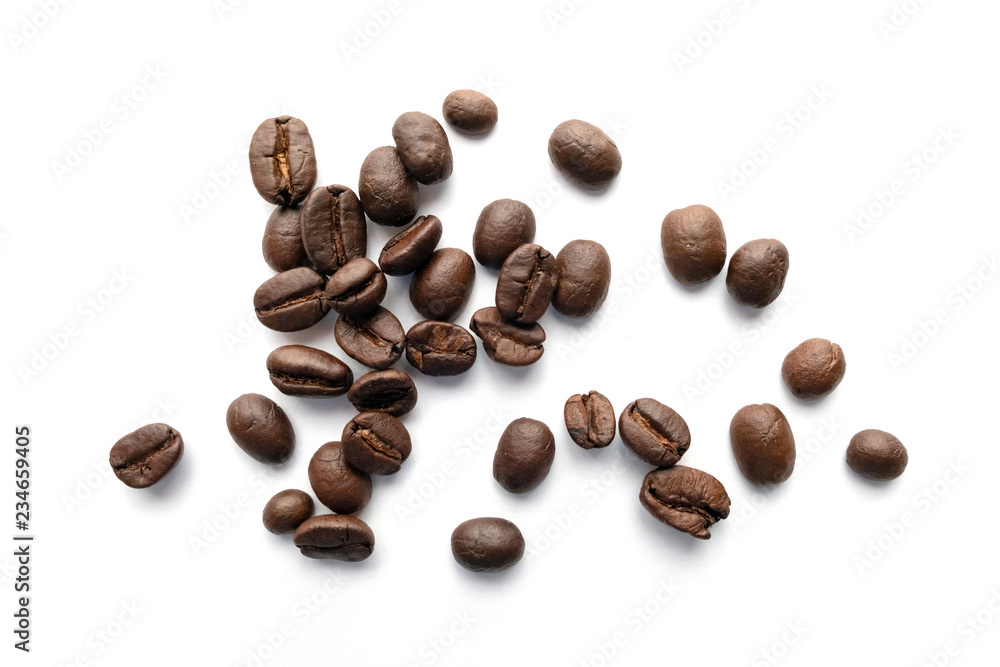 Roasted coffee beans isolated on white background. Roasted coffee beans isolated on white background.