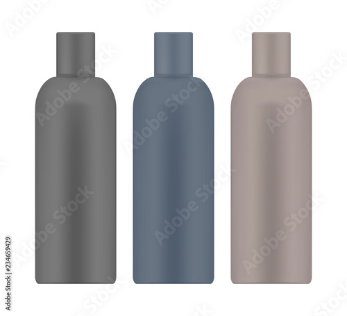 Colored cosmetic bottles isolated on white background