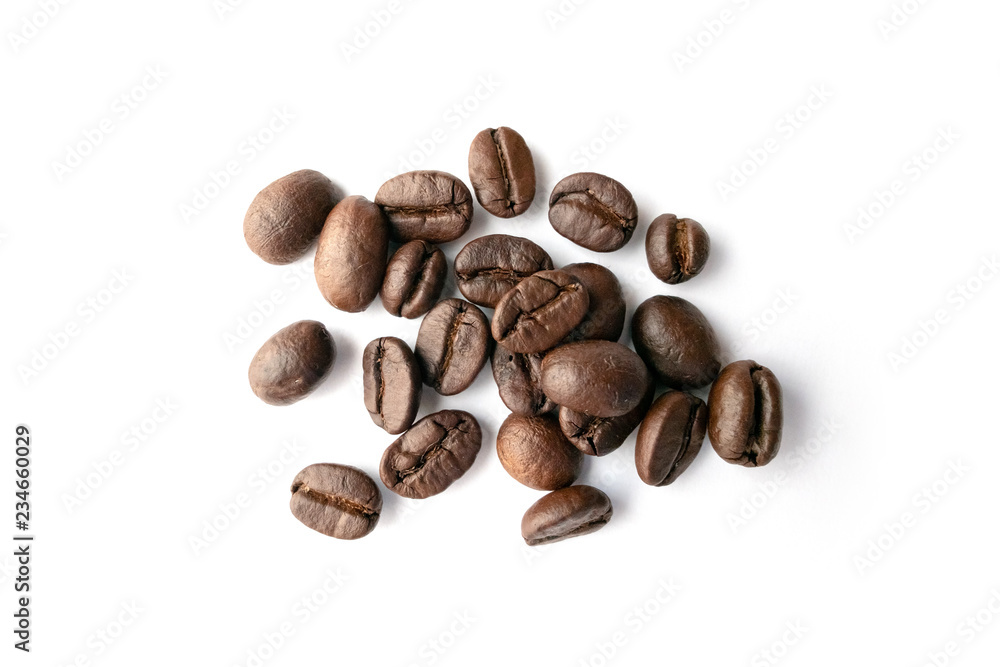 Roasted coffee beans isolated on white background. Roasted coffee beans isolated on white background.