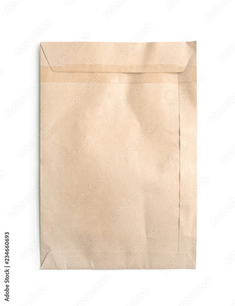 Old paper envelope. Brown paper parcel isolated on white.