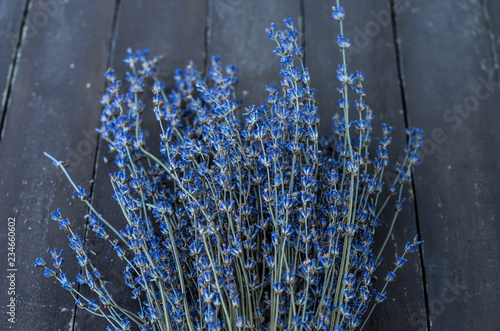 Fototapeta Naklejka Na Ścianę i Meble -  Bouquet of blue lavender on wooden background
