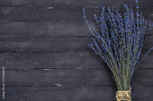 Fototapeta Naklejka Na Ścianę i Meble -  Bouquet of blue lavender on wooden background