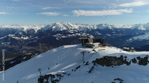Aerial view of snowy mountain top 