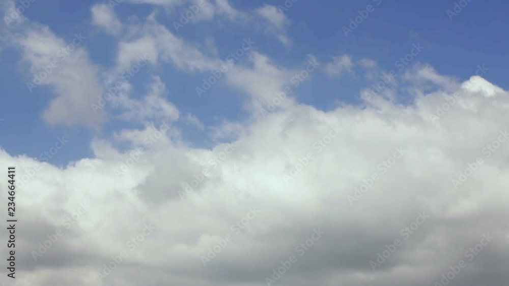 blue sky with clouds, over a valley blue sky with clouds, over a valley