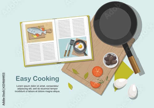 Cooking consept. Recipe book,  frying pan and food. Top view. 