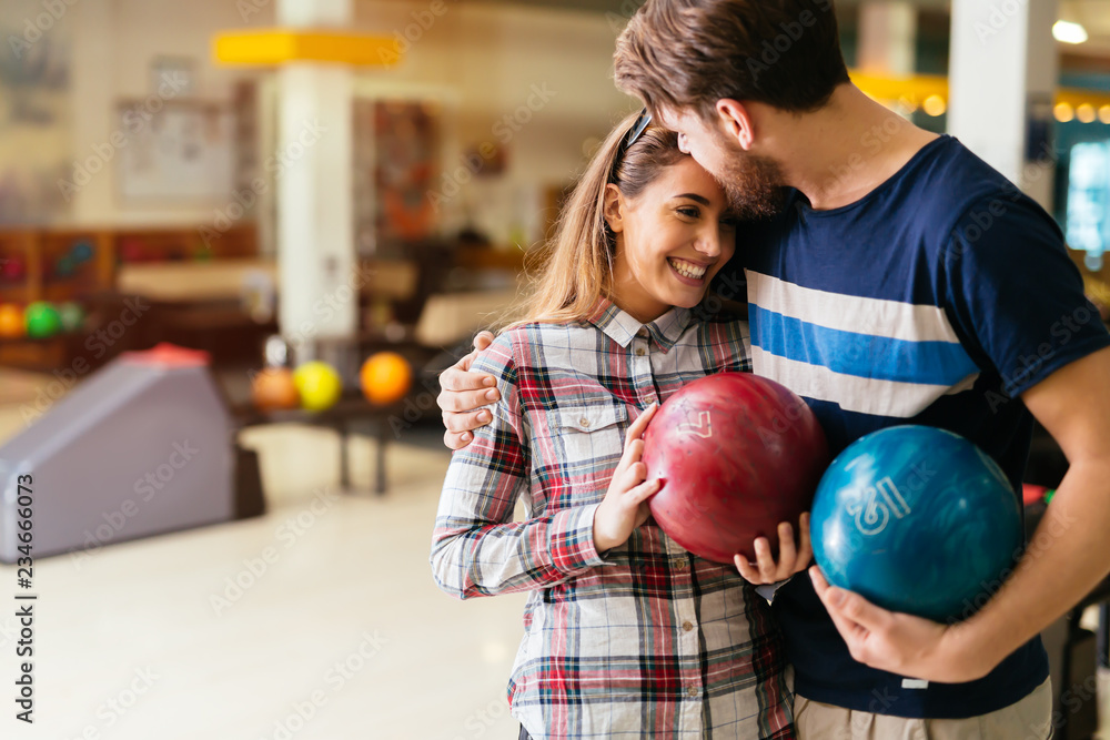 Fototapeta premium Beautiful couple dating and bowling