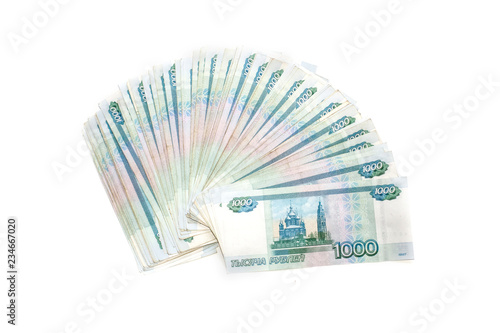 Russian money banknotes currency rouble on white isolated background. in nominal value of one thousand. Rich concept