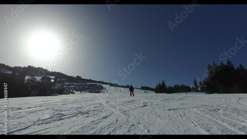 Winter wonderland skier blue skies