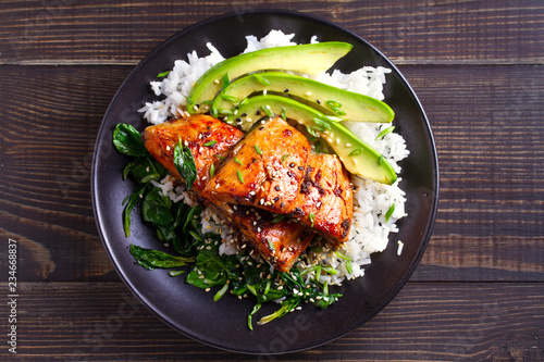 Photos Salmon teriyaki rice bowl with spinach and avocado