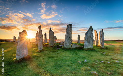 Stunning sunset over the Callanish stone circle on the Isle of Lwais in the Outer Hebrides of Scotland