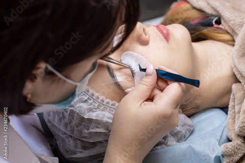 A young girl came to the salon for eyelash extensions.