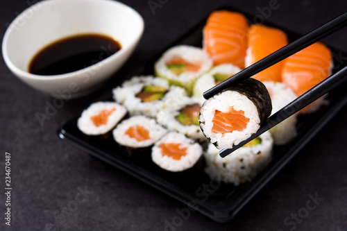 sushi and chopstick on sushi pack background