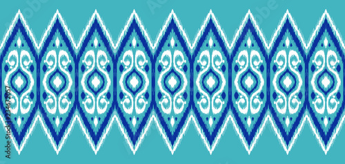 Ikat geometric folklore pattern. photo