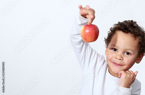 a little boy with apple stock photo photo