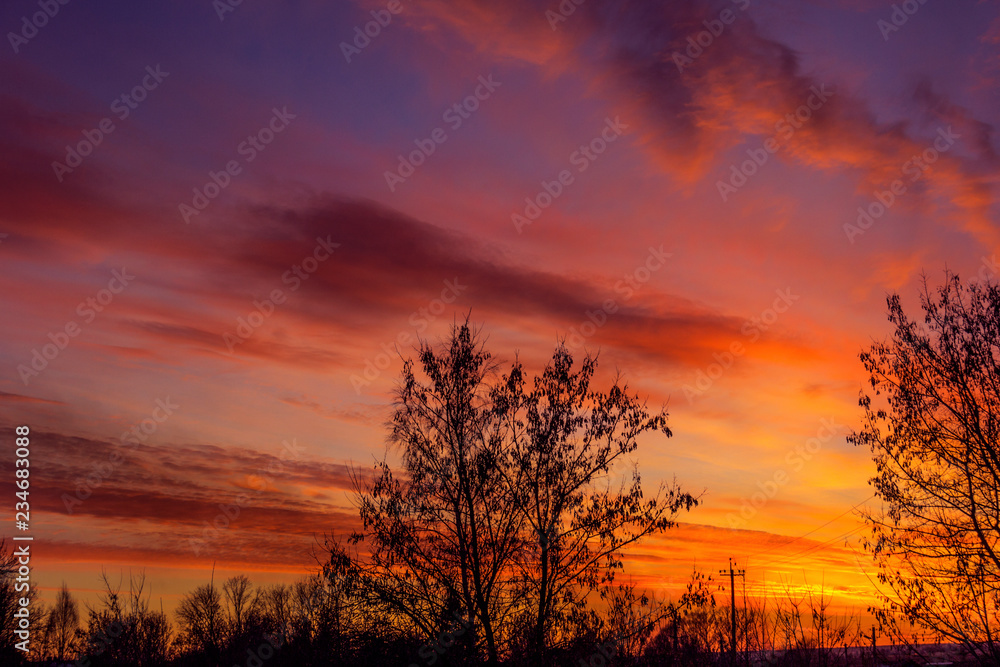 Winter sunset, purple sky clouds