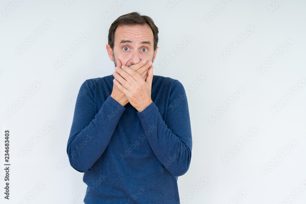 Elegant senior man over isolated background shocked covering mouth with hands for mistake. Secret concept. Elegant senior man over isolated background shocked covering mouth with hands for mistake. Secret concept.