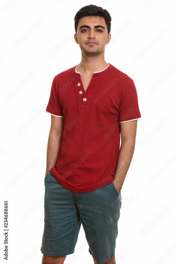 Young handsome Persian man looking at camera Young handsome Persian man looking at camera