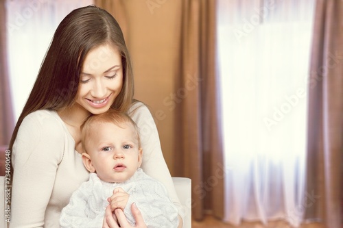 Happy mother with sweet baby boy
