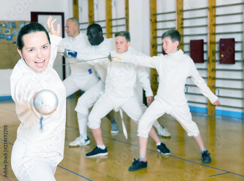 Tableau sur toile Woman training fencing movements