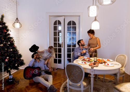 Friends celebrating Christm...