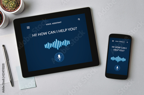 Voice assistant concept on tablet and smartphone screen
