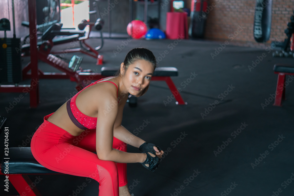 Close up asian beautiful sport girl on wall of gym,Thailand love  health,Slim woman workout concept 10509196 Stock Photo at Vecteezy