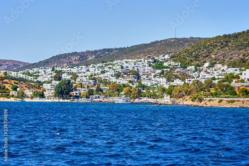 Turquoise water near beach on Aegean coast  sea Turkish resort, Bodrum, Turkey © bondvit
