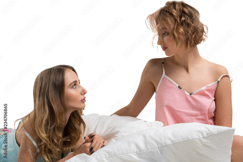 Women in undewear in bed isolated shot Women in undewear in bed isolated shot