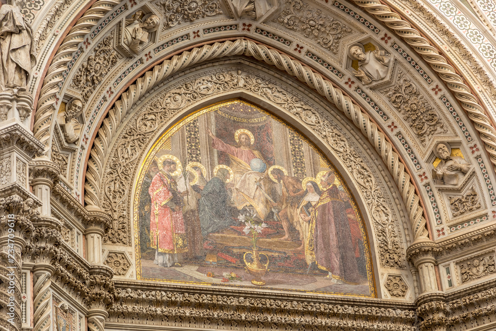 Art at walls of Santa Maria del Fiore - famous cathedral church of Florence in Italy