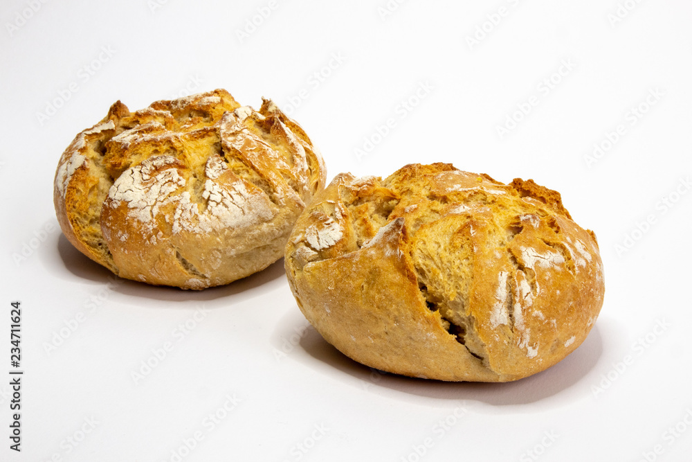 Two rustic bread rolls against white background Two rustic bread rolls against white background