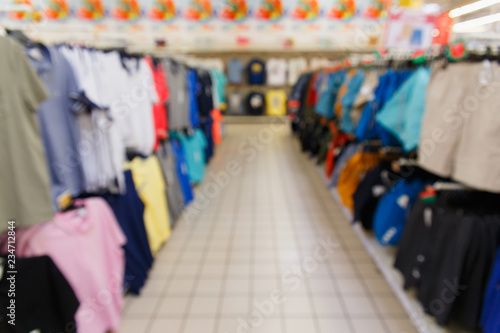 Blurred image with clothing store.