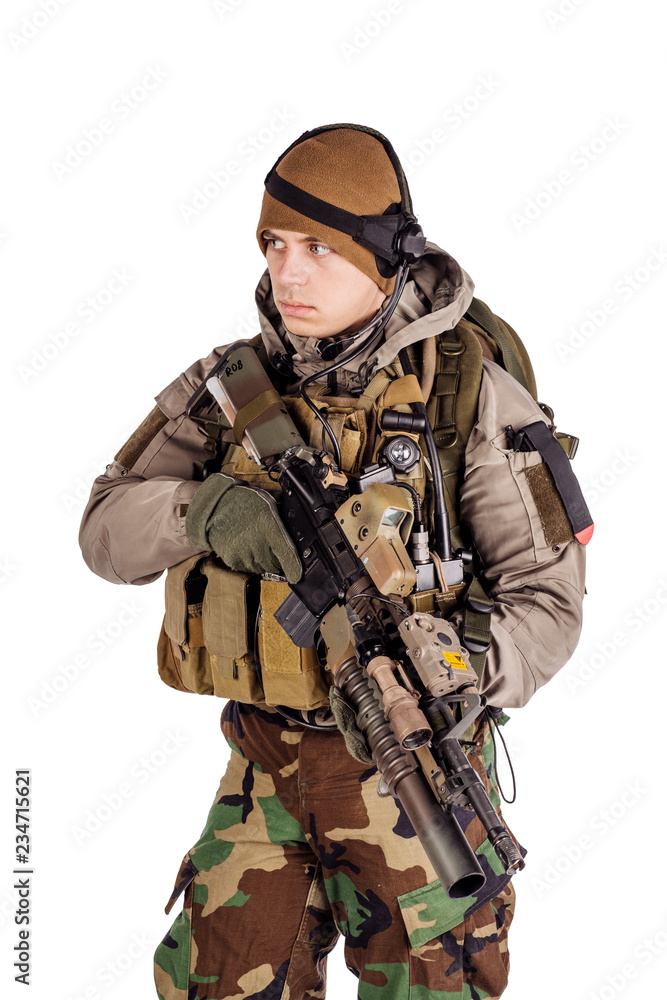 Fototapeta premium Portrait soldier or private military contractor holding automatic rifle. war, army, weapon, technology and people concept. Image on a white background.