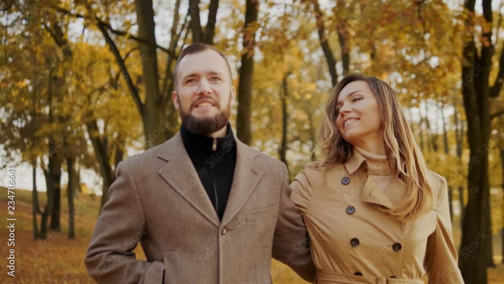 Beautiful couple walking in a forest Beautiful couple walking in a forest