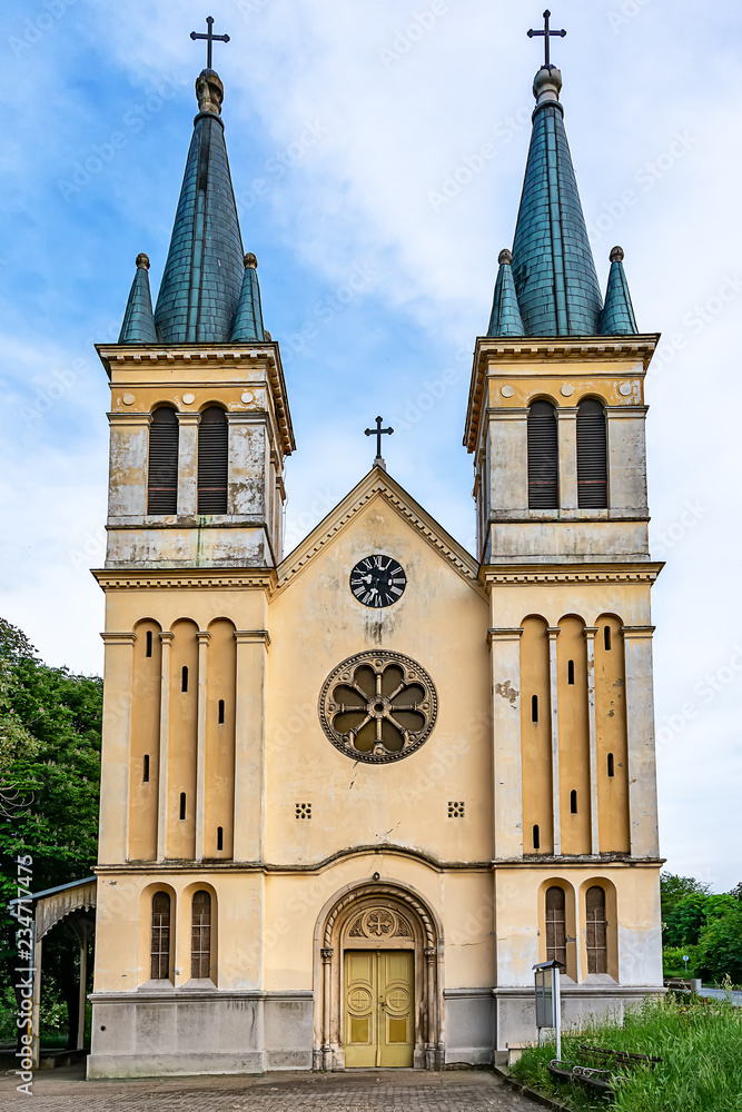 Fototapeta premium Petrovaradin, Serbia - May 02, 2018: Church of the Snow Lady on Tekija, Serbia. The church is a typical Roman Catholic church. 