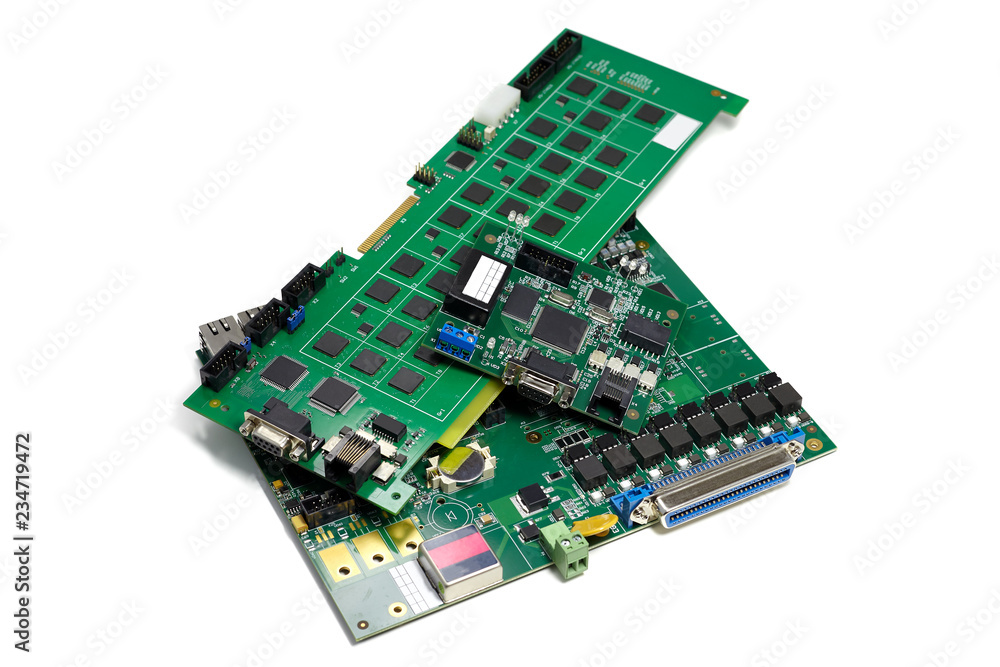 Set of electronic printed circuit boards with microchips and other components, angled view, isolated on white Set of electronic printed circuit boards with microchips and other components, angled view, isolated on white