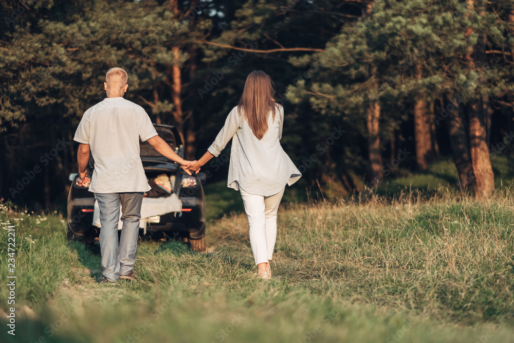 Outdoor Portrait of Young Couple in Love Outdoor Portrait of Young Couple in Love
