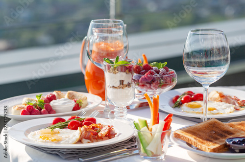 Breakfast  served table on the balcony